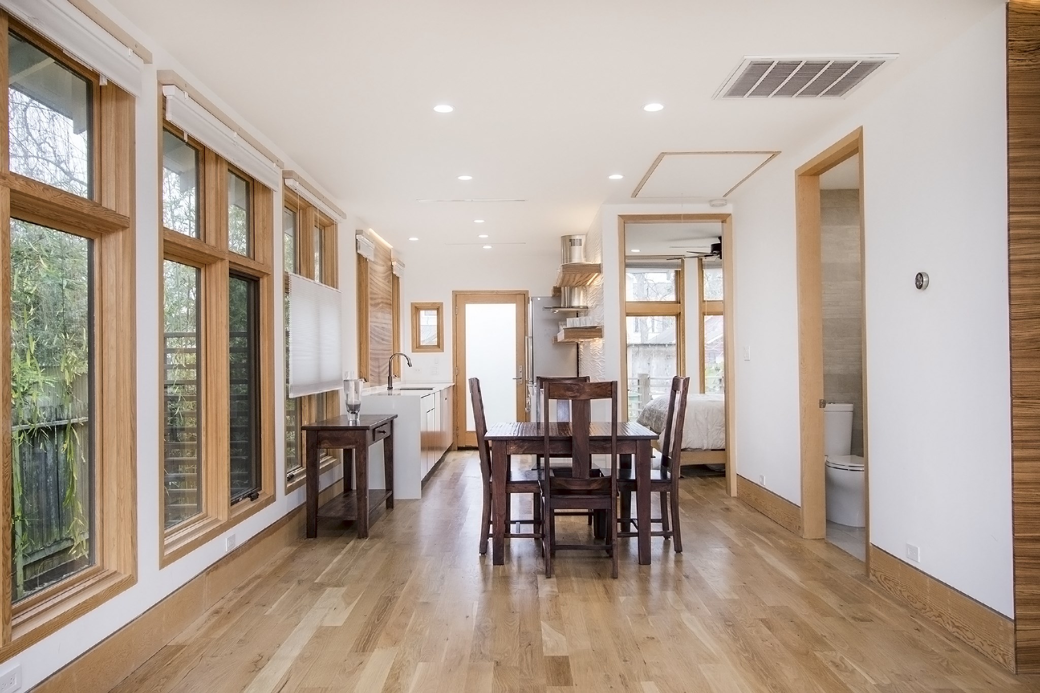 811 East 23rd Street Houston, TX 77009 - Photo 23 of 30 a view of a a dining room with furniture window and wooden floor