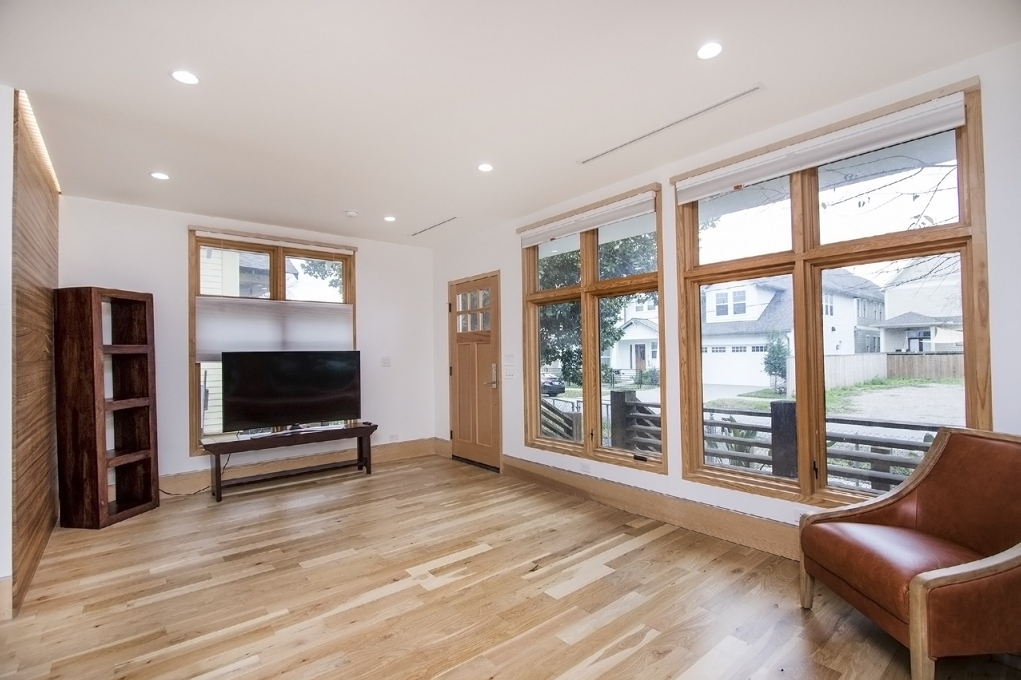 811 East 23rd Street Houston, TX 77009 - Photo 26 of 30 a view of a livingroom with furniture and a flat screen tv