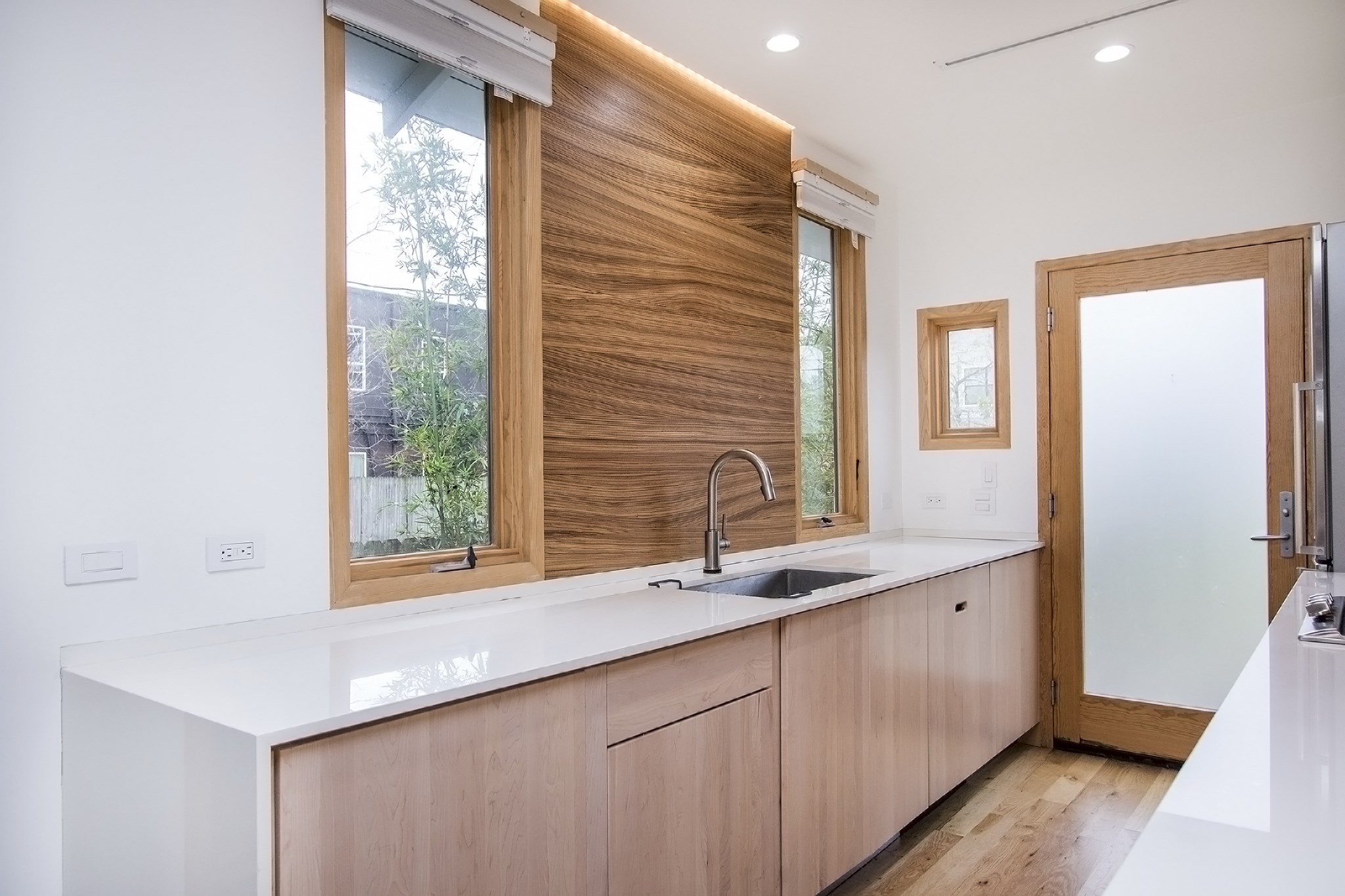 811 East 23rd Street Houston, TX 77009 - Photo 9 of 30 a kitchen with a sink and a window