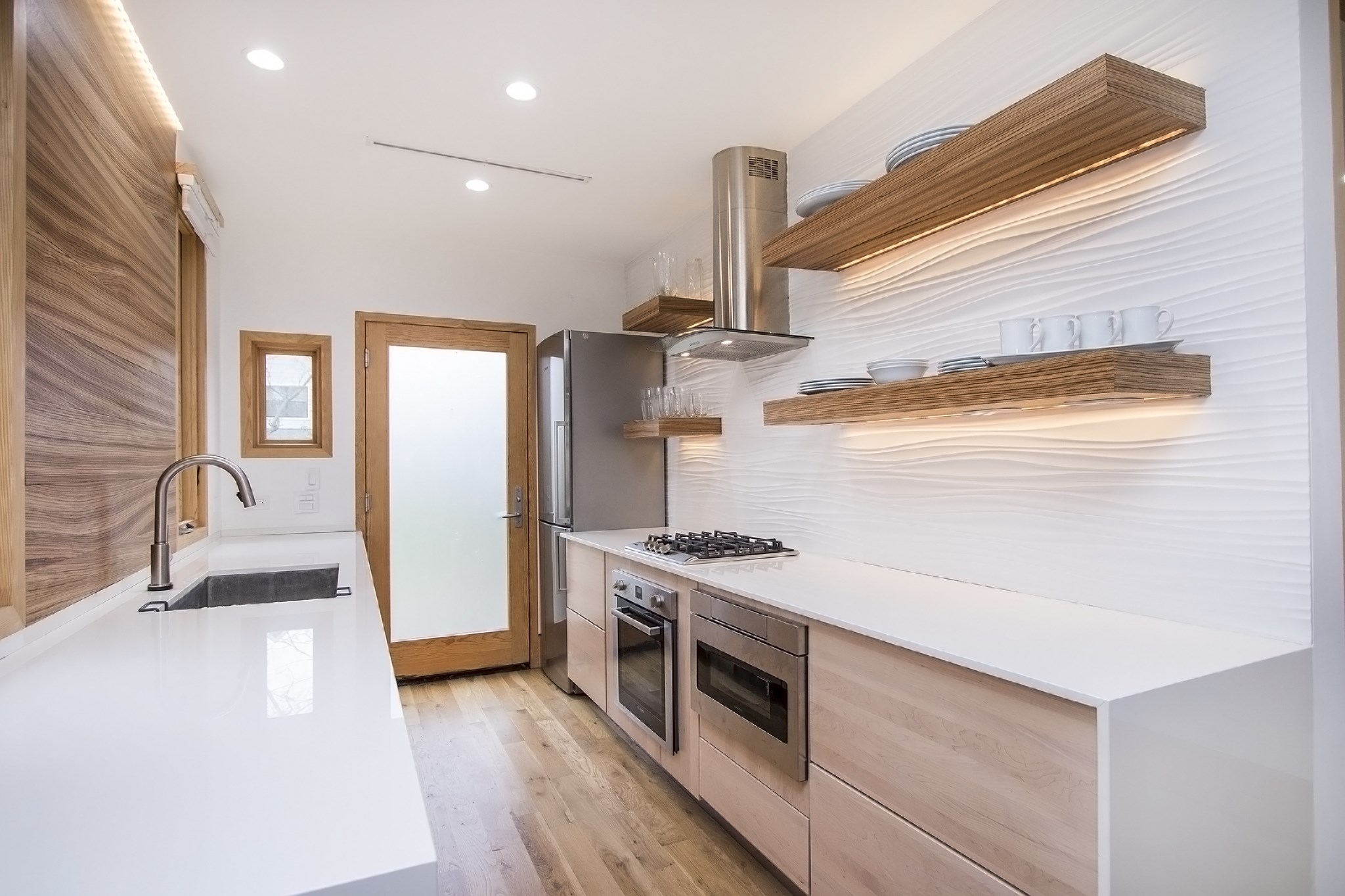 811 East 23rd Street Houston, TX 77009 - Photo 10 of 30 a kitchen with a stove and a refrigerator