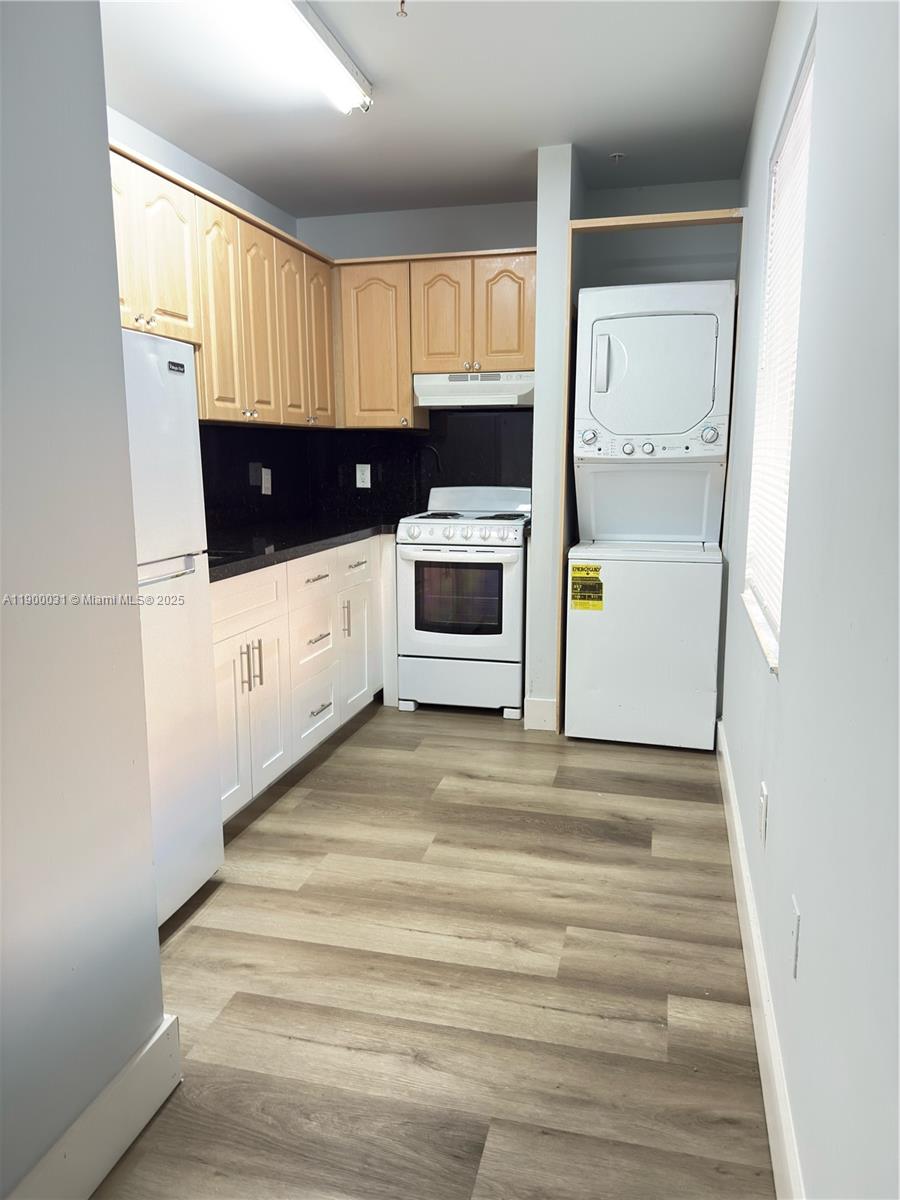 1930 Southwest 2nd Street, Unit 6 Miami, FL 33135 - Photo 2 of 6 a view of an empty room with a window