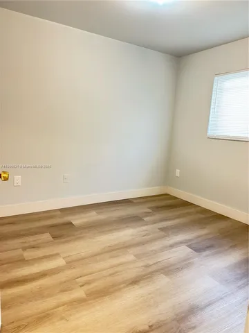 a view of a room with an empty space