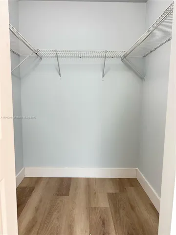 a view of a room with racks on the wall