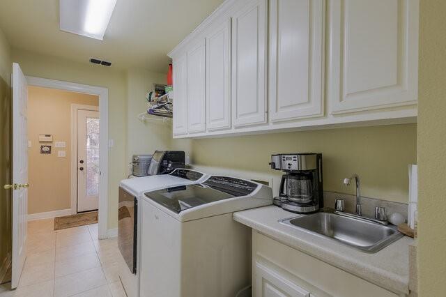 103 Ridgeway Gap Ovilla, TX 75154 - Photo 16 of 40 a kitchen that has a sink and a stove
