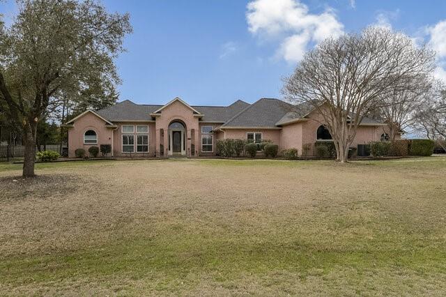 103 Ridgeway Gap Ovilla, TX 75154 - Photo 2 of 40 a front view of a house with a yard