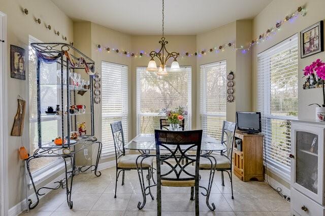 103 Ridgeway Gap Ovilla, TX 75154 - Photo 22 of 40 a view of a dining room with furniture window and outside view