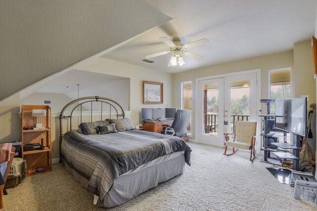 103 Ridgeway Gap Ovilla, TX 75154 - Photo 30 of 40 a spacious bedroom with a bed a table and large mirror