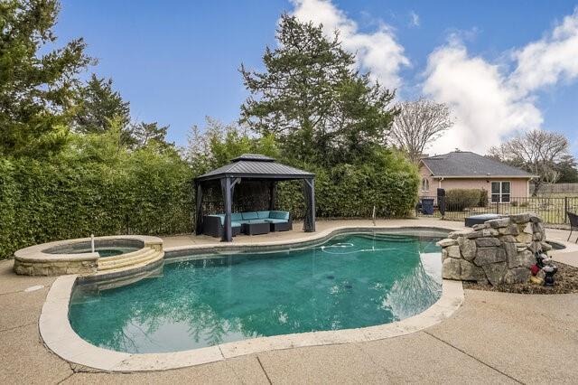 103 Ridgeway Gap Ovilla, TX 75154 - Photo 37 of 40 a view of a house with swimming pool and sitting area