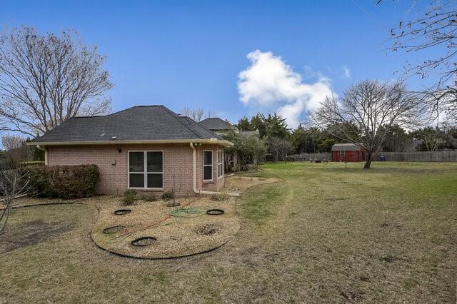 103 Ridgeway Gap Ovilla, TX 75154 - Photo 39 of 40 a view of a house with a backyard