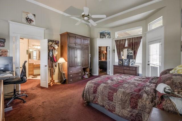 103 Ridgeway Gap Ovilla, TX 75154 - Photo 6 of 40 a bedroom with a bed gym equipment and a large window