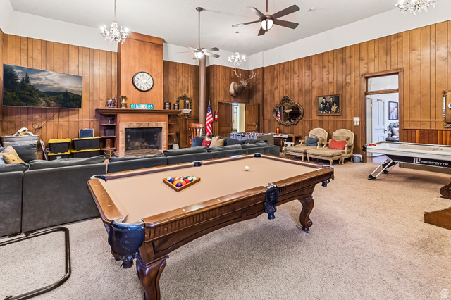 21 North Main Street Kingston, UT 84743 - Photo 33 of 107 Playroom with hanging lights, billiards, carpet, wood walls, and a ceiling fan