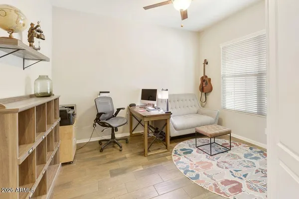 a living room with furniture and a window