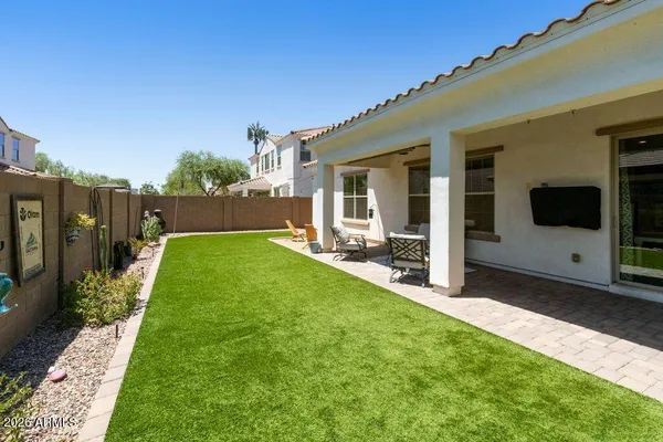 a view of a backyard with garden