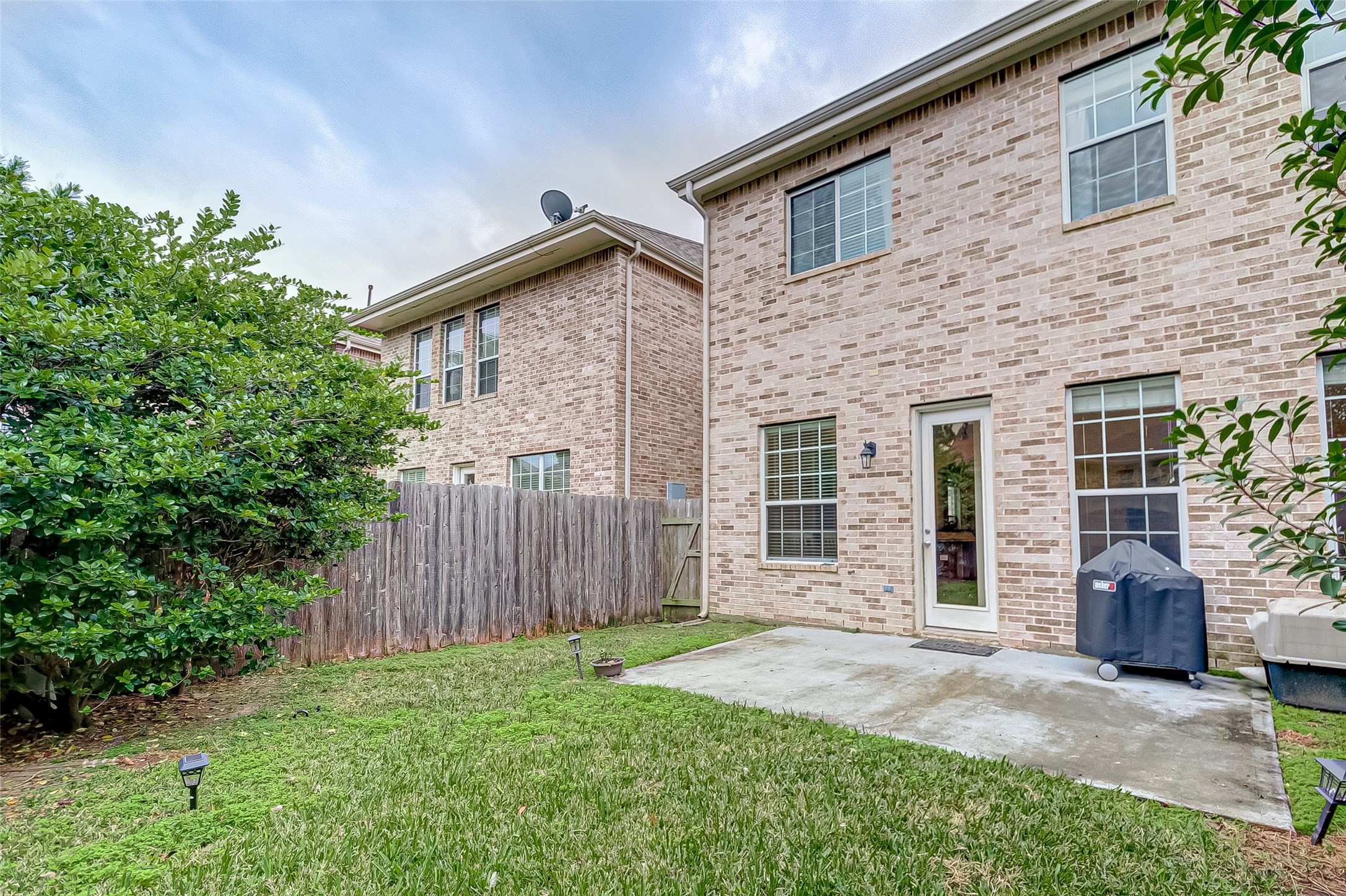 14418 Basalt Lane Houston, TX 77077 - Photo 27 of 32 front view of a house with a yard