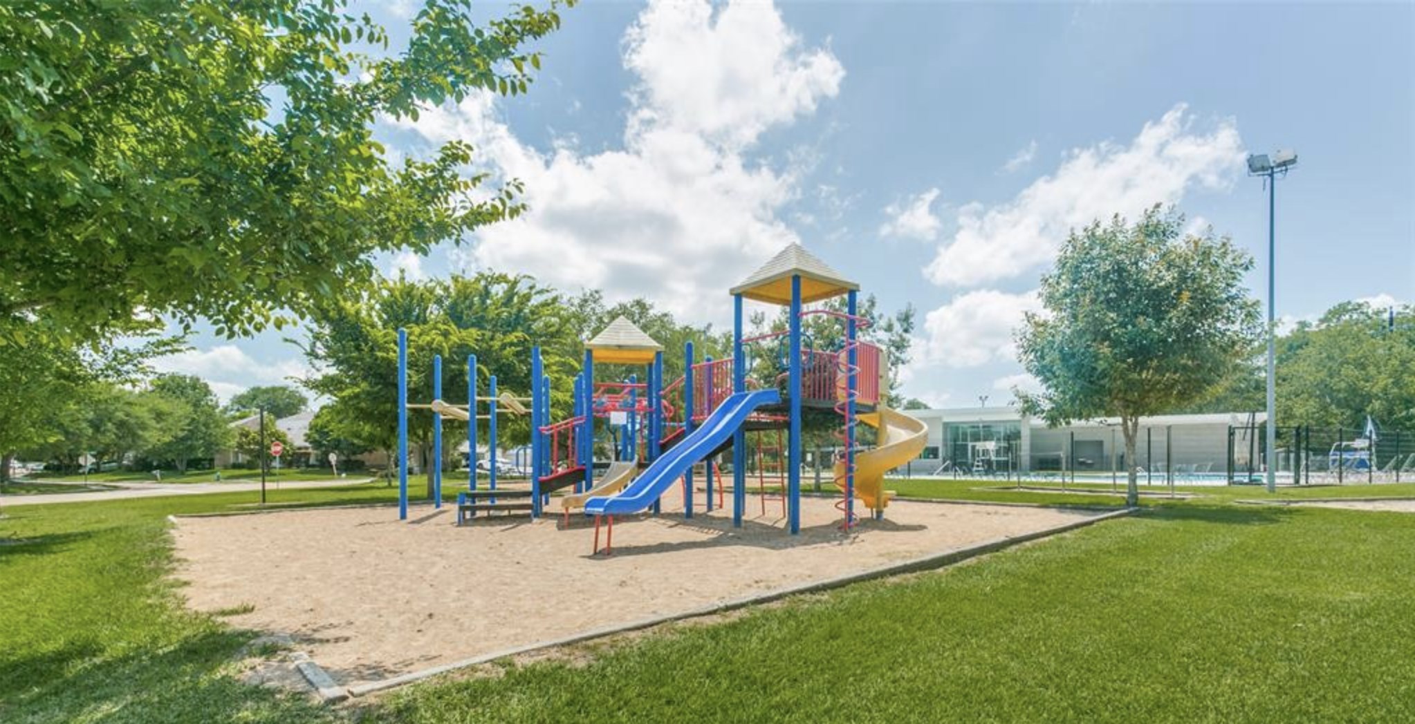 14418 Basalt Lane Houston, TX 77077 - Photo 30 of 32 a view of park with swings