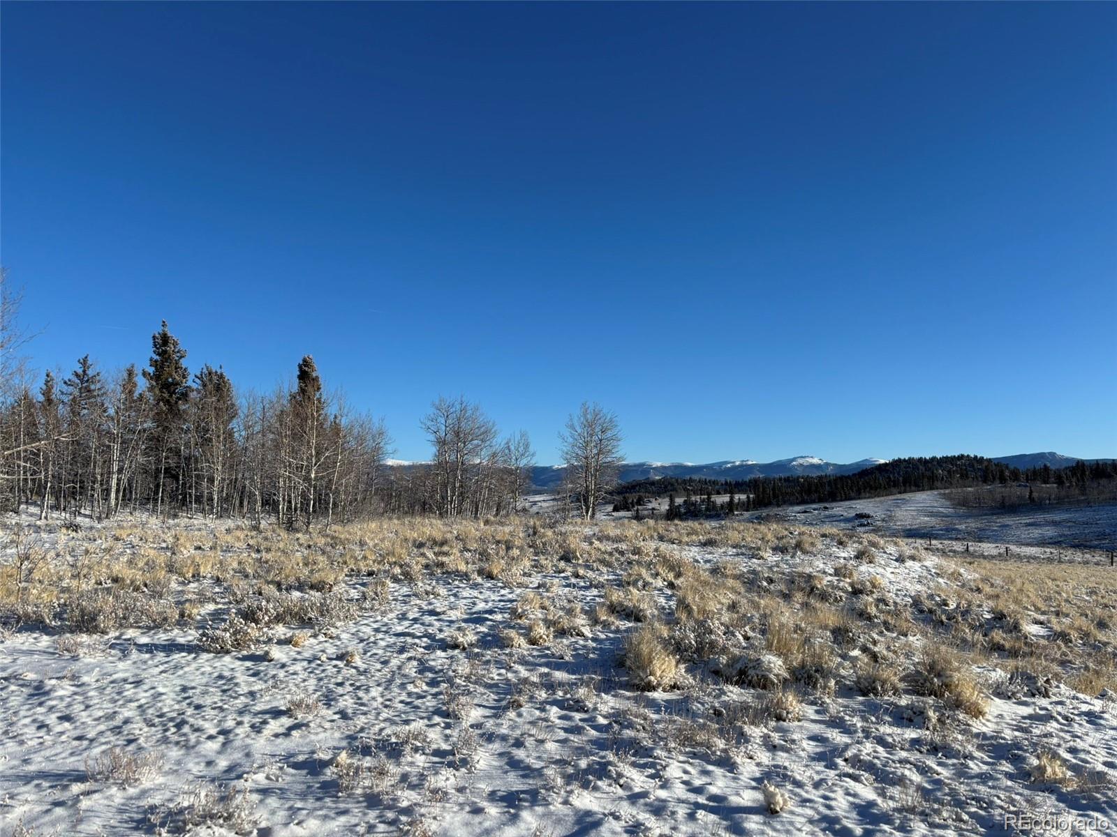 769 Mockingbird Circle Como, CO 80432 - Photo 14 of 18 a view of a snow with a yard