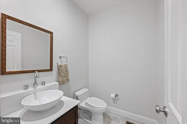 a view of storage and utility room with washer and dryer