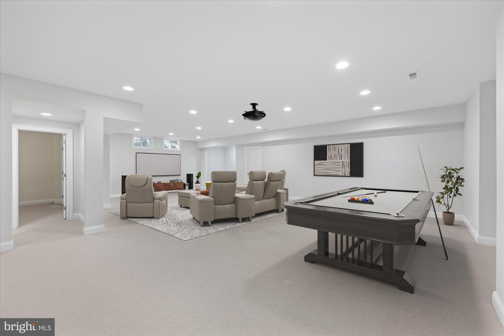5608 Warwick Place Chevy Chase, MD 20815 - Photo 42 of 57 a living room with furniture a table and a flat screen tv