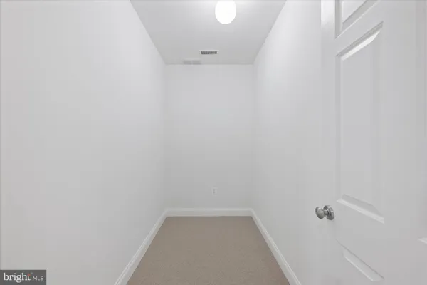 a view of a storage room with washer and dryer