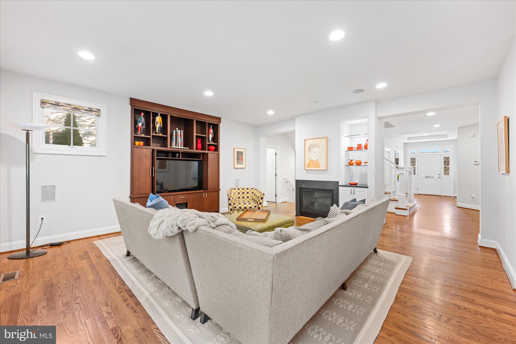 5608 Warwick Place Chevy Chase, MD 20815 - Photo 7 of 57 a living room with furniture and a wooden floor