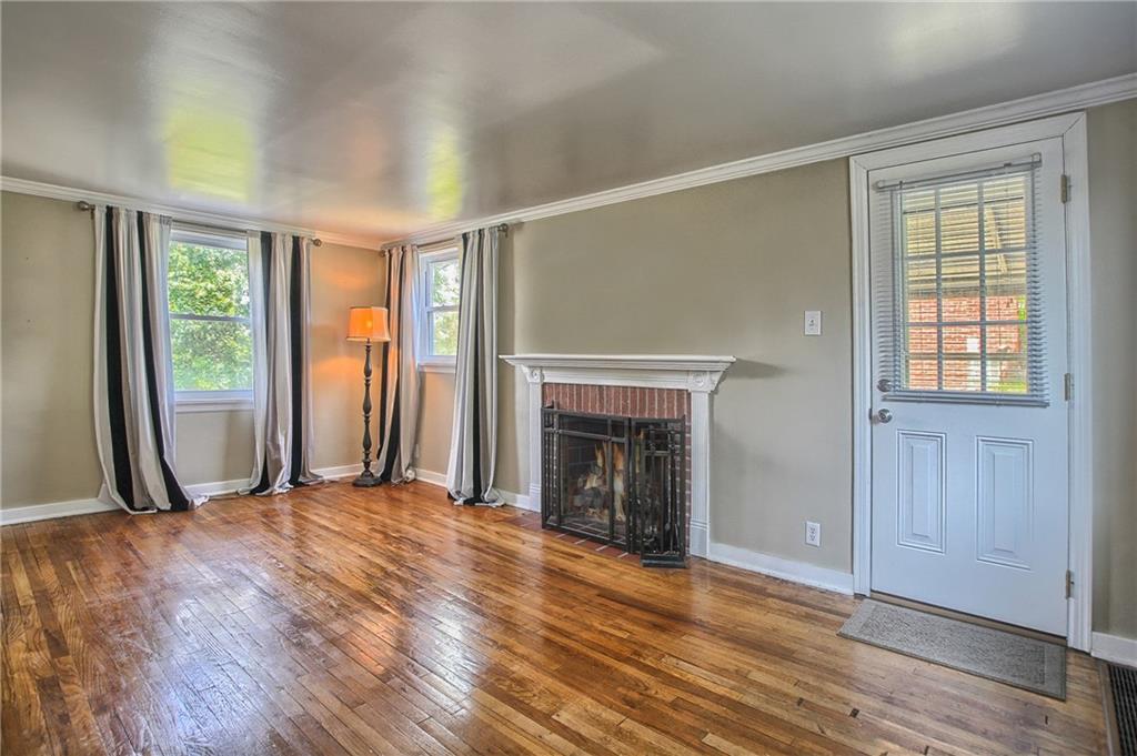 1906 Bower Hill Road Pittsburgh, PA 15243 - Photo 3 of 15 This lovely & inviting living boost a wood burning fireplace & lovely hardwood floors. The welcoming floor plan of this living leads out to the tranquil covered patio