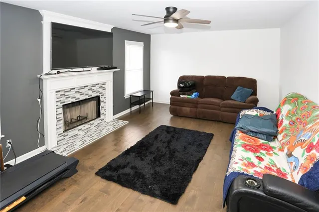 a bathroom with a sink toilet and mirror