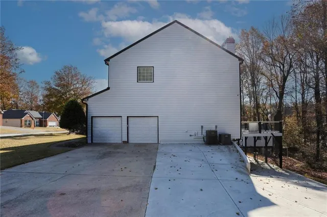 a view of balcony with wooden floor and outdoor seating