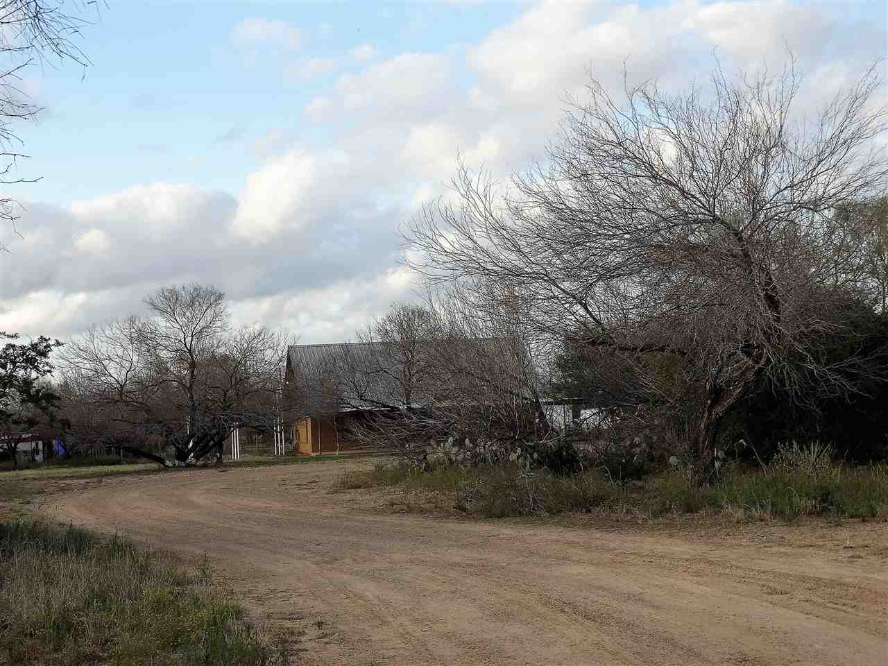 264 Los Huisaches Road Laredo, TX 78045 - Photo 2 of 13 a view of a outdoor space with trees