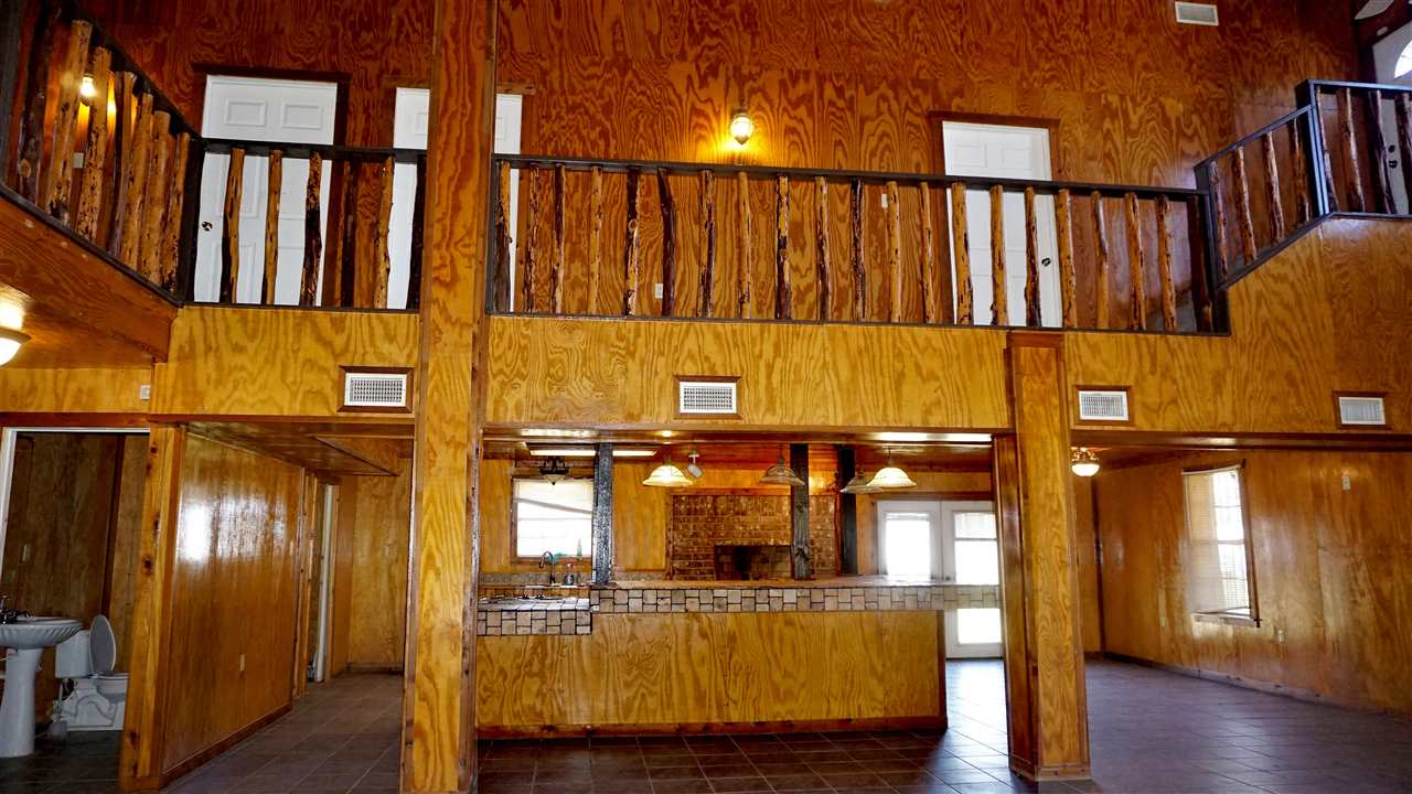 264 Los Huisaches Road Laredo, TX 78045 - Photo 10 of 13 a view of a porch with wooden floor