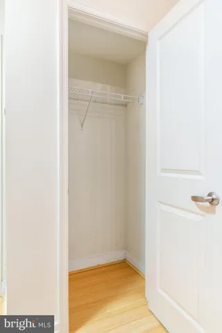 a kitchen with granite countertop a sink and cabinets