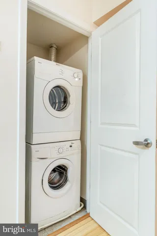 a kitchen with stainless steel appliances a stove a microwave and a refrigerator