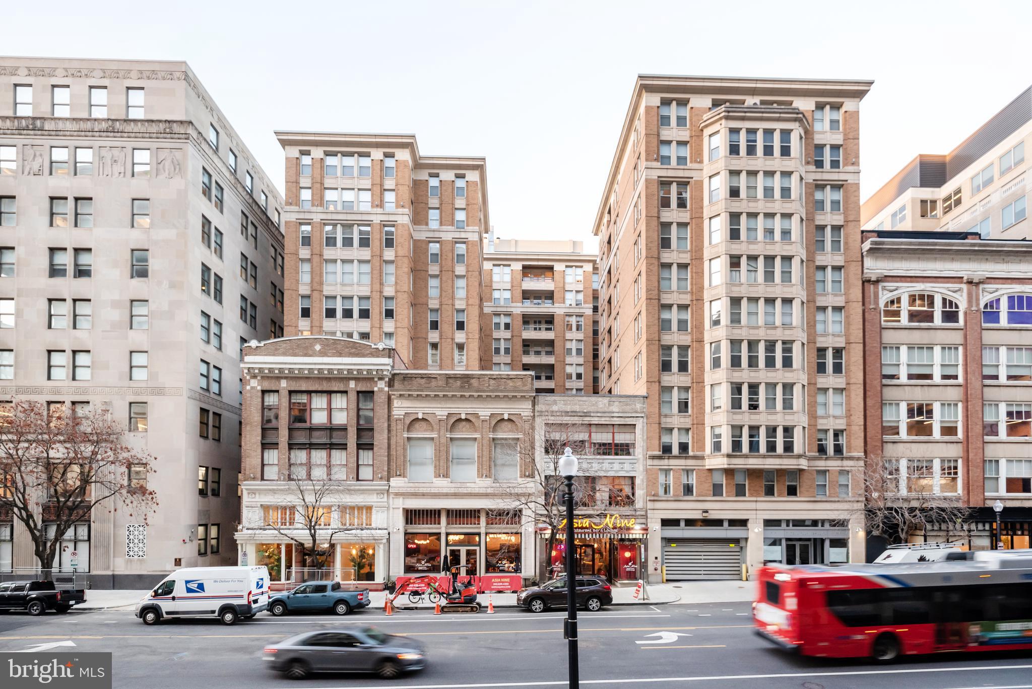 915 E Street Northwest, Unit 103 Washington, DC 20004 - Photo 2 of 43 front view of a building with a street