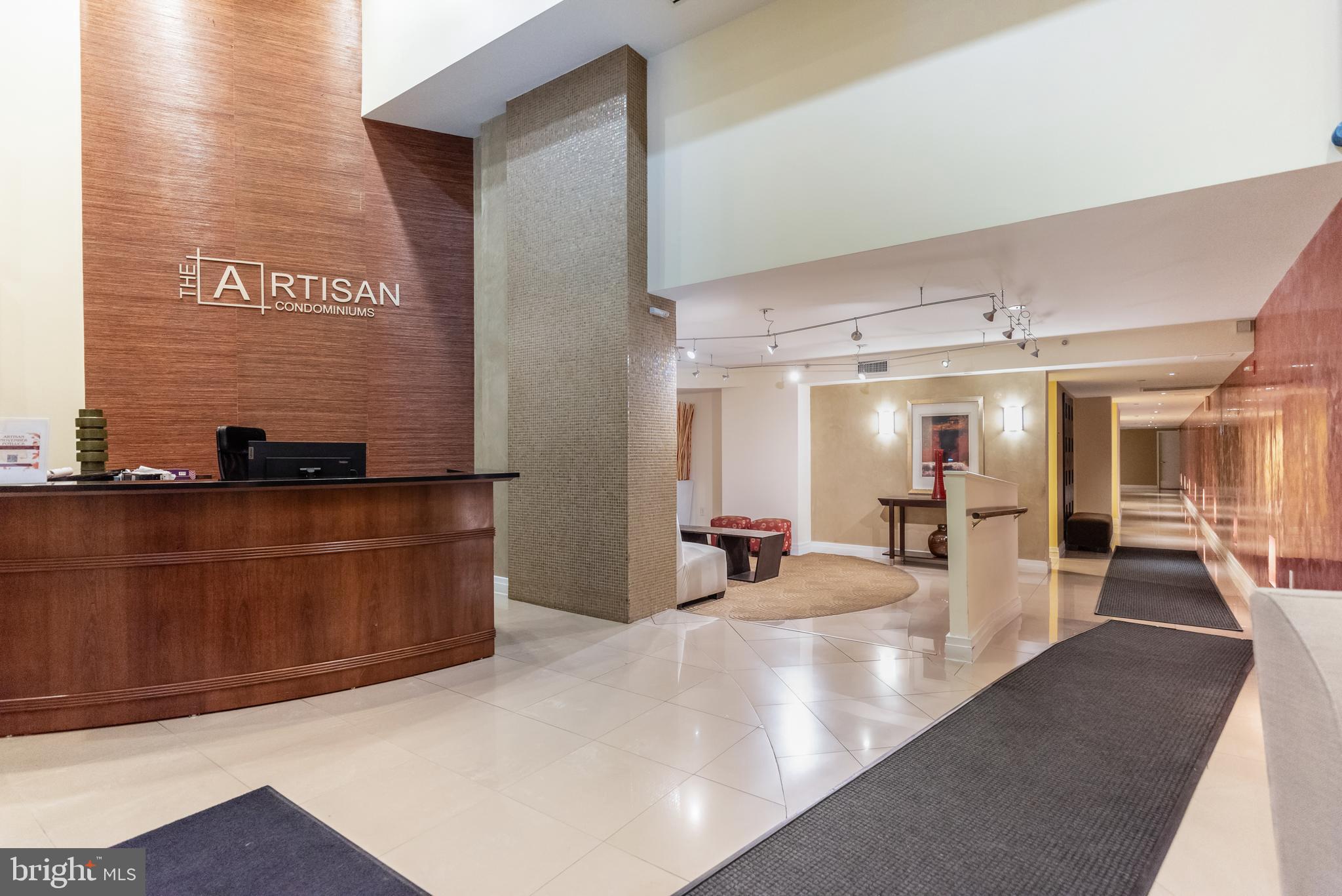 915 E Street Northwest, Unit 103 Washington, DC 20004 - Photo 33 of 43 a lobby with furniture and window