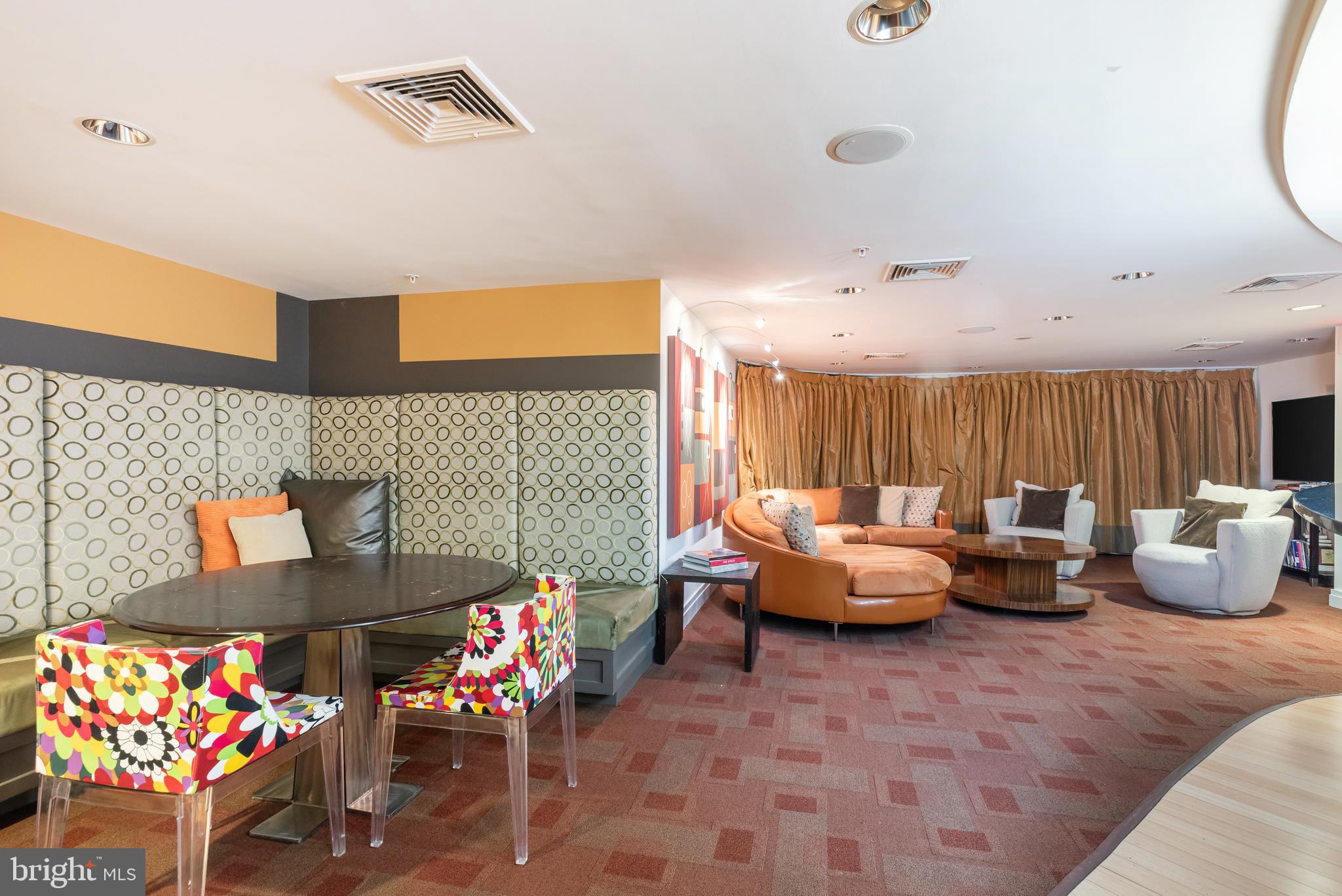 915 E Street Northwest, Unit 103 Washington, DC 20004 - Photo 37 of 43 a living room with furniture and a couch