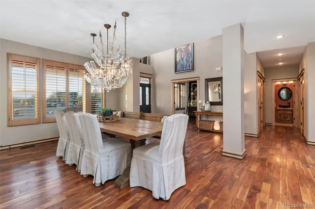 a view of a living room with furniture and a window