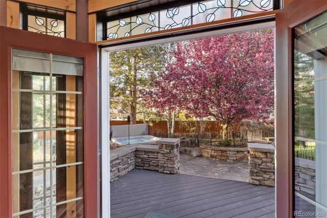 a spacious bathroom with a tub sink and mirror