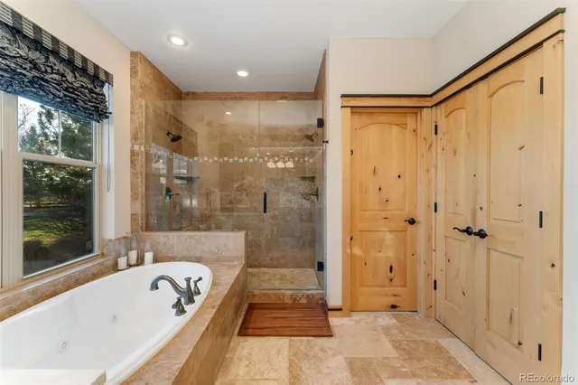 a view of living room with furniture and a fireplace