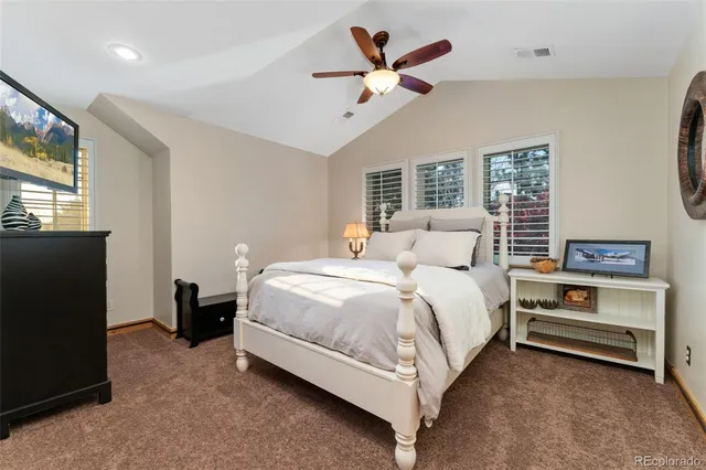 a bedroom with a bed and furniture