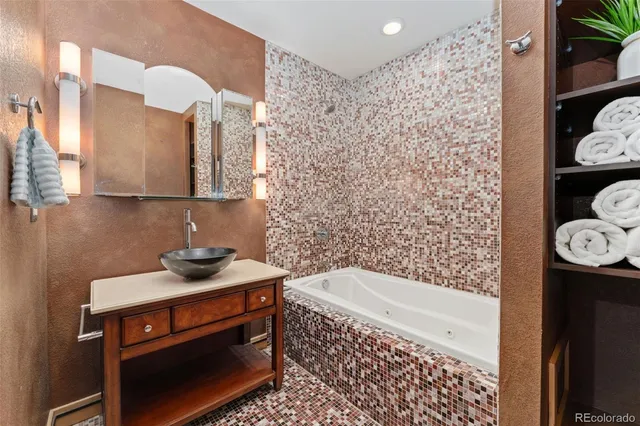 a bedroom with a bed and a walk in closet