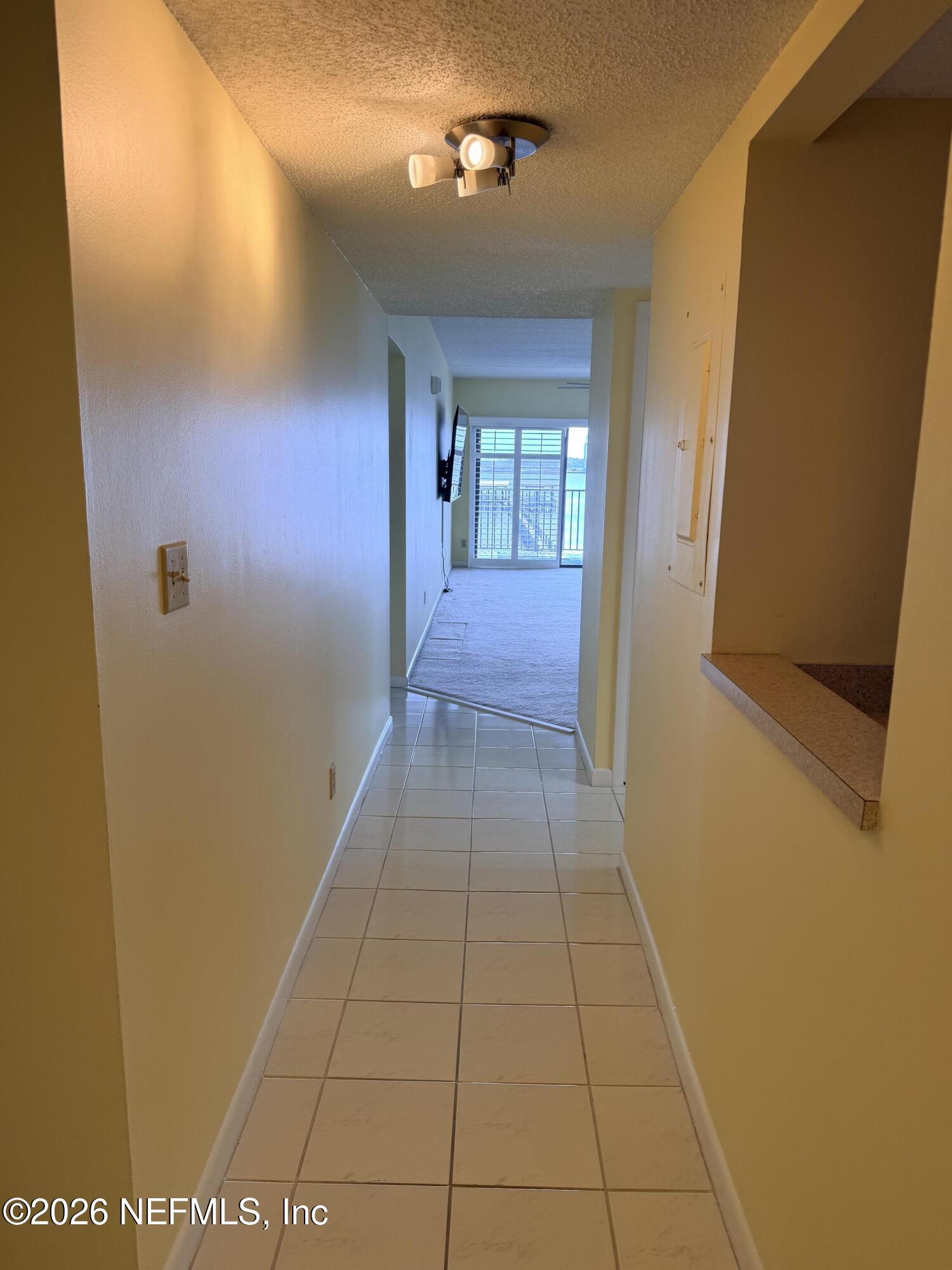 2280 Shepard Street, Unit 306 Jacksonville, FL 32211 - Photo 10 of 13 Hall to living room