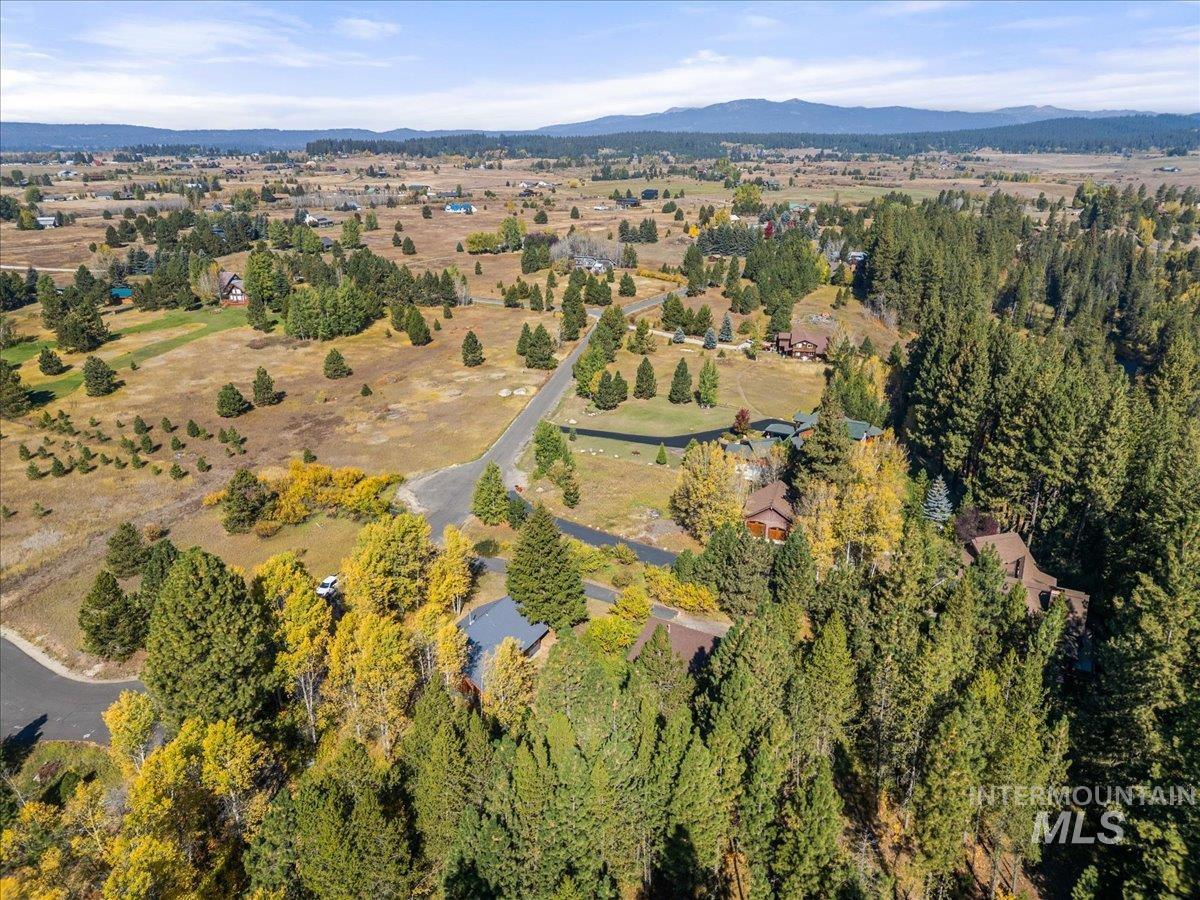 13982 Comfort Road McCall, ID 83638 - Photo 47 of 50 Aerial overview of property's location with a mountain backdrop