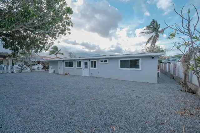 a view of house with outdoor space and bathroom
