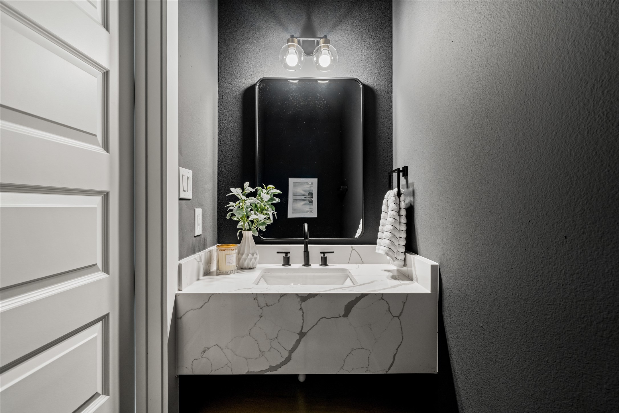 4108 Cortlandt Street Houston, TX 77022 - Photo 19 of 43 a bathroom with a sink and a mirror