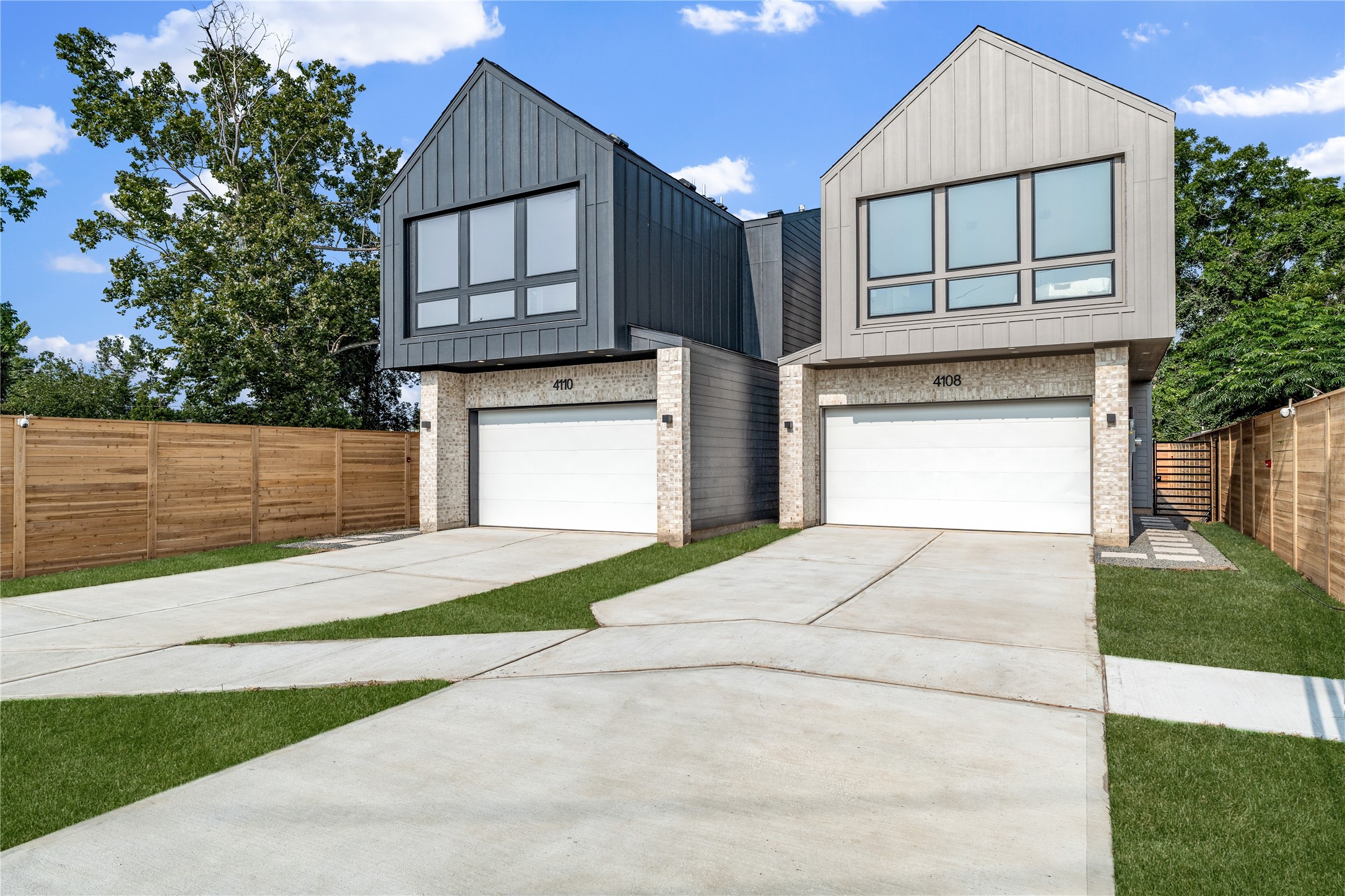 4108 Cortlandt Street Houston, TX 77022 - Photo 3 of 43 a front view of a house with a garage and a garage