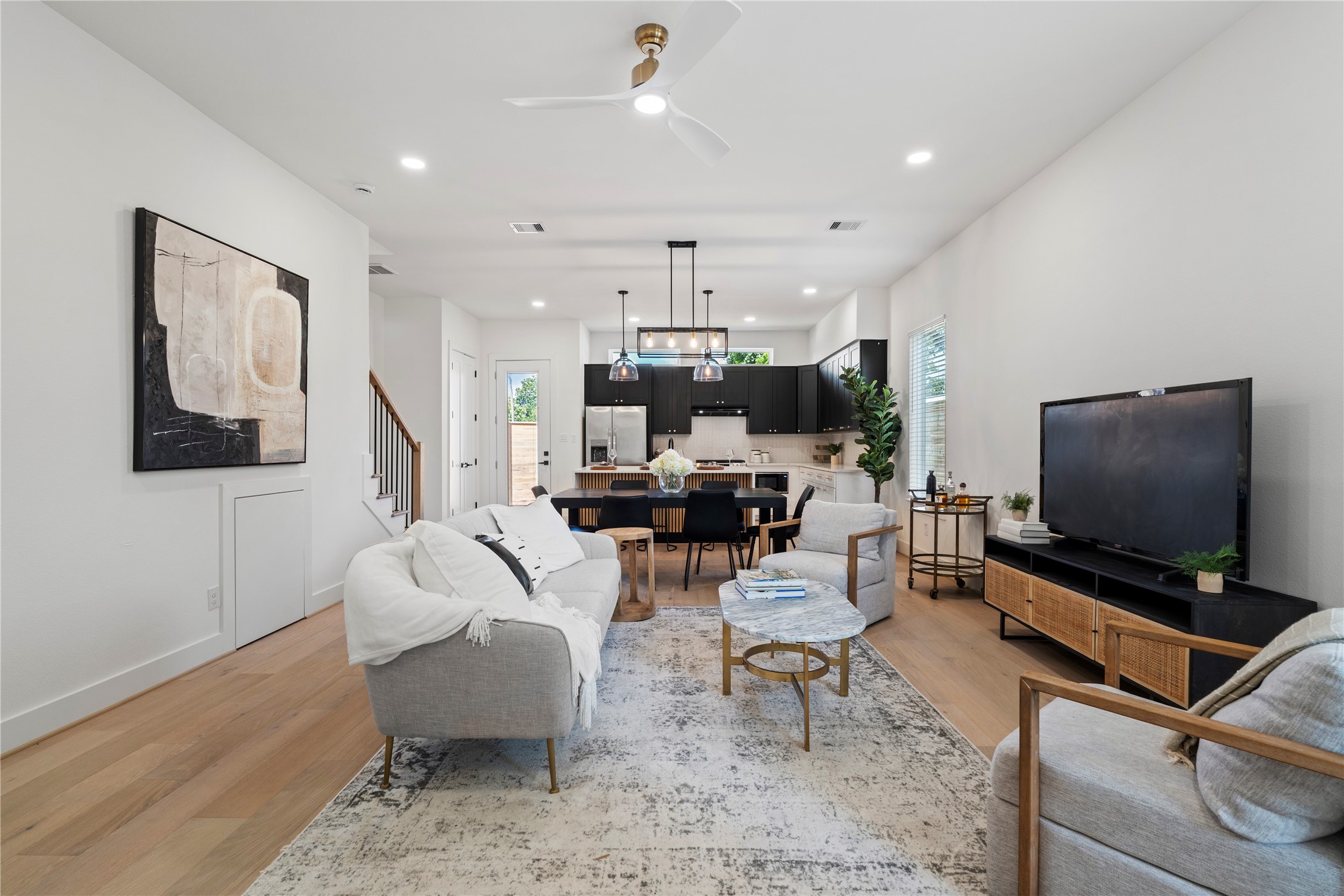 4108 Cortlandt Street Houston, TX 77022 - Photo 6 of 43 a living room with furniture and a flat screen tv