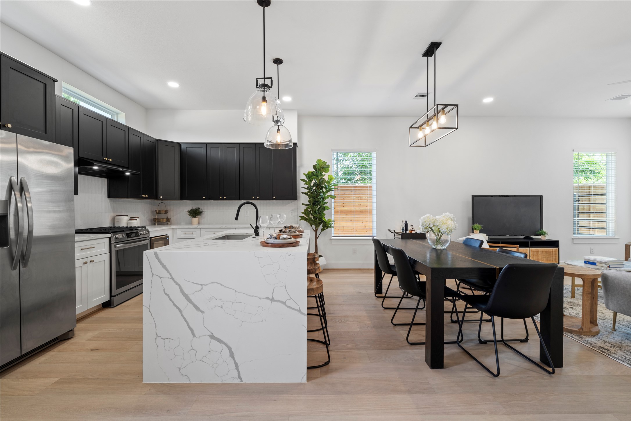 4108 Cortlandt Street Houston, TX 77022 - Photo 10 of 43 a view of kitchen with sink microwave and refrigerator