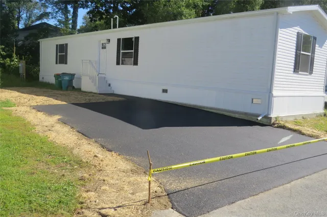 a view of a backyard of the house