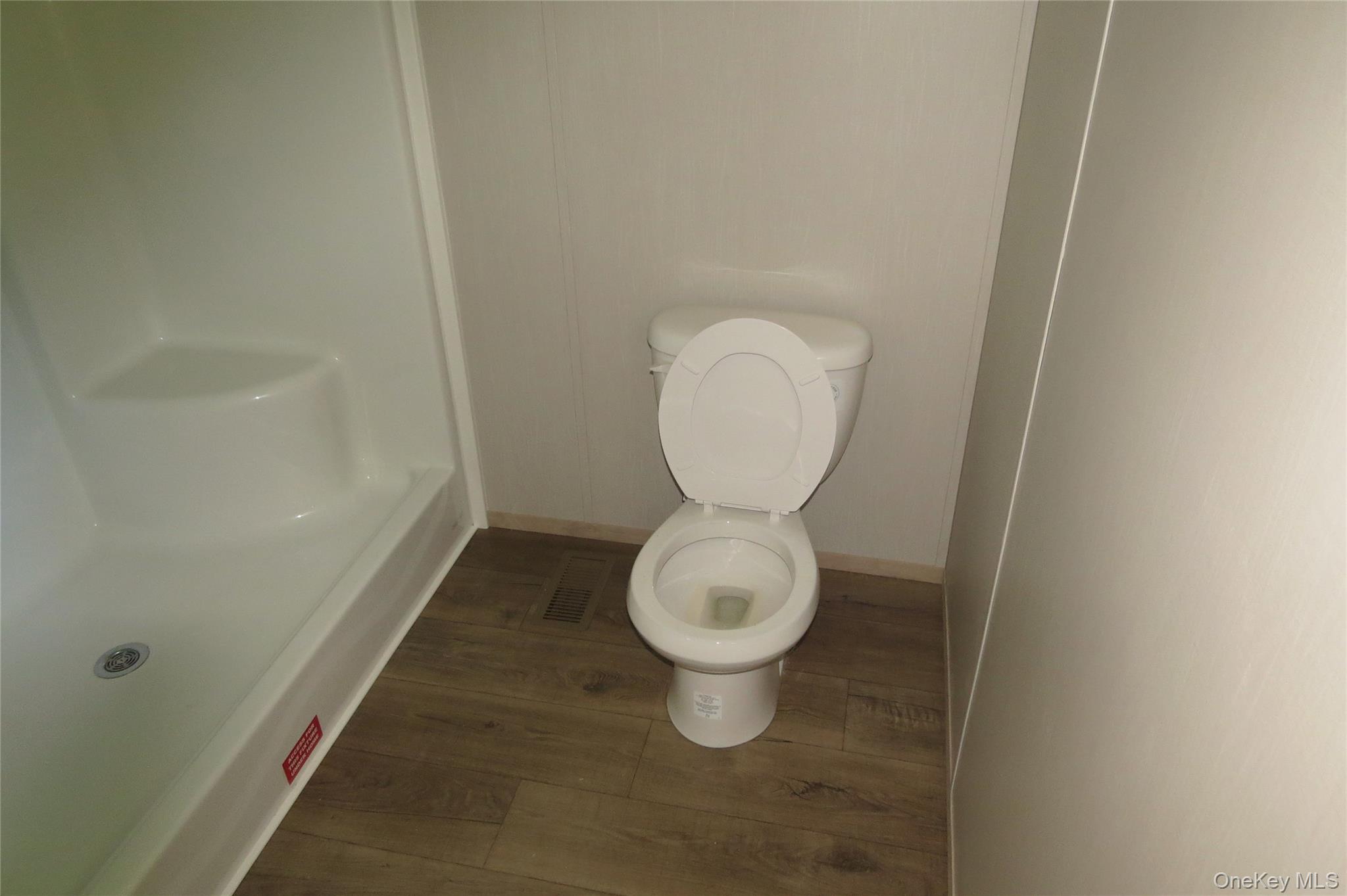 723 Beekman Road, Unit 48 Hopewell Junction, NY 12533 - Photo 13 of 14 a bathroom with a toilet and a sink