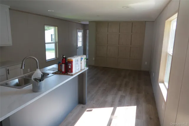 a kitchen with a sink and a window