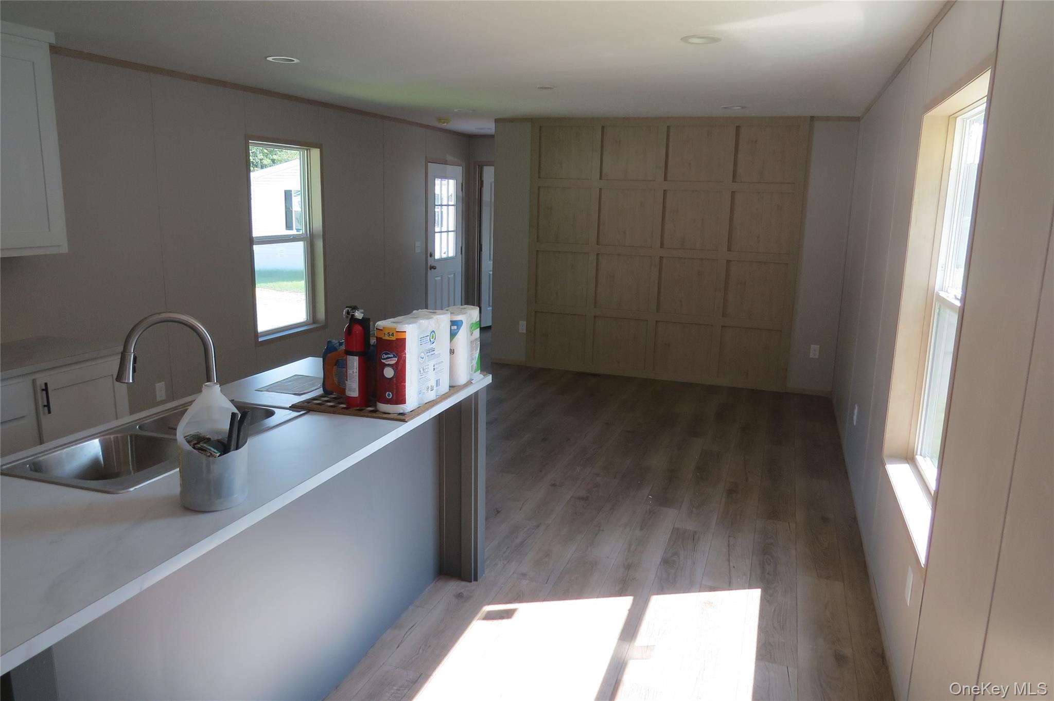 723 Beekman Road, Unit 48 Hopewell Junction, NY 12533 - Photo 7 of 14 a kitchen with a sink and a window